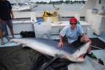 Teenager catches record sized blue shark